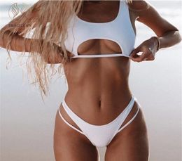 Peachtan Solid white bikini two piece suit High cut swimwear women Sexy hollow out swimsuit female Push up bathing suit Y2003193509355