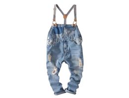 hip hop streetwear bib pants overall jean Fashion men overalls Ripped s for Male denim jumpsuit 2107236457524