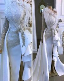 2020 Arabic Aso Ebi Sparkly Sexy Cheap Evening Dresses One Shoulder Crystals Feather Prom Dresses Sheath Formal Party Second Recep6391356