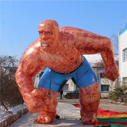 wholesale 5m 20ft high Giant Brown Inflatable Muscle Man With Strip For City Decoration