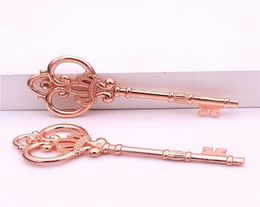 Charms Sweet Bell 10pcslot 3284mm Rose Gold Antique Metal Alloy Lovely Large Crown Key Vintage Jewelry Keys D0182114329120