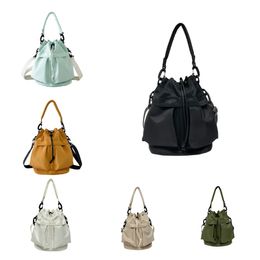 2024 New top luxury Designer Single Shoulder Crossbody Fashion Casual Bucket Bags Large Capacity black white green Nylon Handheld Drawstring Bag