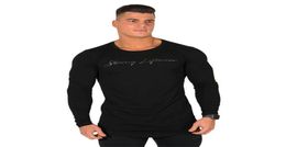 Designer Highelasticity Sporting Tshirt Men Slim long Sleeve Fitness T shirt Men039s solid gyms Bodybuilding Tshirt Tee4443105