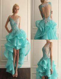 Jewel Sheer Neckline High Low Short Homecoming Dresses Turquoise Prom Gowns With Lace Applique Backless Ruffles Cocktail Gowns Cus4303643
