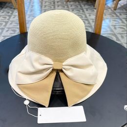 European design bow straw hat summer outdoor cap can be folded woven sun hats