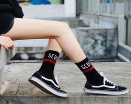 3 pairs of girls sports socks medium-length cotton high-tube socks letter sockings3595309