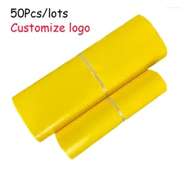 Storage Bags 50Pcs/lots Yellow Courier Pouch Custom LOGO Envelope Clothing Mailer Parcel Ecommerce Packaging