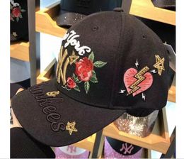 Korean version of the embroidery rose curved skull baseball cap fashion letters cap couple hip hop sun hat7690554