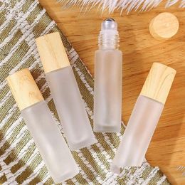 Roll On Bottles Wholesale 5Ml 10Ml Bottle Frosted Clear Glass Roller With Wood Grain Plastic Cap For Essential Oil Per Cosmetic Drop D Dhmaf