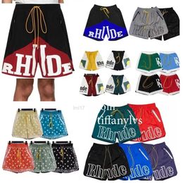 Designer Shortsmens Pants Designer Mens Shorts Rhude Shorts Summer Fashion Beach Pants Men High Quality Street Wear Red Blue Black Purple Pants Mesh Drawstring Zipp