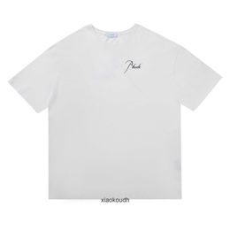 Rhude High end designer T shirts for New letter round neck pure short sleeve mens and womens casual Tshirt same style lovers through short sleeves with 1:1 logo