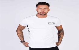 Mens Summer gyms Fitness Tshirt Crossfit Bodybuilding Slim Shirts printed Oneck Short sleeves cotton Tee Tops clothing5818353