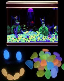 100pcslot Fluorescent Stone Garden Decor Luminous Stones Glow In Dark Decorative Pebbles Outdoor Fish Tank Decoration Pebble Rock9903423