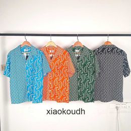 Rhude High end designer T shirts for Mens street fashion cashew flower pattern print short sleeved T-shirt is popular With 1:1 original labels