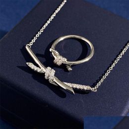 Pendant Necklaces Fashion New Beautif Knot Necklace For Women Men Jewelry Screw Large Cake Fl Nail Glossy Sier Drop Delivery Pendants Otxls