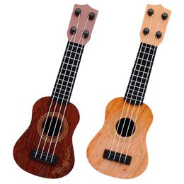 Guitar 2 pieces of mini four stringed piano simulated guitar childrens education childrens music instrument toys model plastic toys WX
