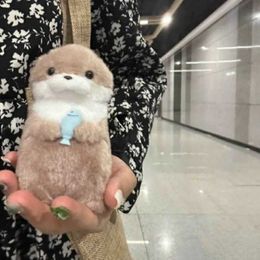 Stuffed Plush Animals Cute otter holding fish plush doll keyring lightweight hanging pendant used for school bag key wallet doll toy gift 11cm d240520