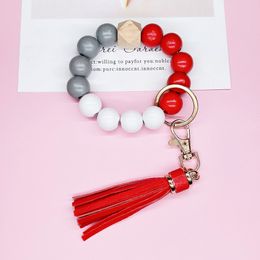 Tassel wood bead imitation silicone bead bracelet keychain, popular cross-border Amazon bracelet keychain pendant for women in Europe and America