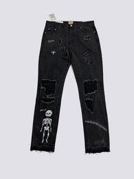 Uomini jeans v designer di lusso jeans jeans stampati pantaloni escursionistici strappati hip hop high street ricamo trapunte di tendenza strappato