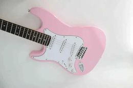Guitar The girl uses a pink electric guitar with 6 strings right hand left hand price 22 Frets actively picking up WX