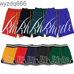 Rhude Men Breathable Beach Shorts Women Casual Mesh Track Oversize Rhude Waist Drawstring Free Shipping for Black and White Shorts HPOI