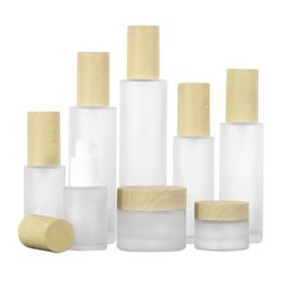 Packing Bottles Wholesale 20Ml 30Ml 40Ml 50Ml 60Ml 80Ml 100Ml Frosted Glass Cream Jar With Imitated Wooden Lids Cap Lotion Spray Bottl Dhhjl