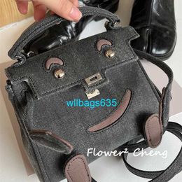 Ky Dole Bags Leather Handbag Flowercheng Cowboy Army Cloth Little Monster Doll Mini Smiling Face Bag Crossbody Handbag Female with logo WLJ2