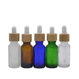 Packing Bottles Wholesale Glass Dropper Essential Oil Bottle With Eye Droppers And Bamboo Lids Liquid Cosmetic Containers Drop Deliver Dhaeb