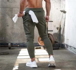 2019 New Style Mens Jogger Sweatpants Man Gyms Workout Fitness Cotton Trousers Male Casual Fashion Skinny Track Pants T2007065573340