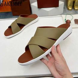 Slippers 2023 Summer Brand Flat Slide Mens Round Toe Hollow Leather Beach Mule Slide Designer Leisure Party Walking Shoes J240520