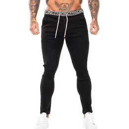 Pantaloni da uomo gingtto jeans attillati maschi pantaloni in denim casula nera streetwear miglia maschio vestito primaverilo-autunno cotone elastico in vita zm1005 j240510