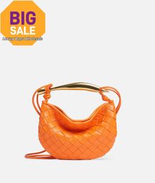 Luxury Womens Bag Mini Sardine BotegaVeneta Mini Intrecciato leather cross-body bag with metallic top handle Papaya