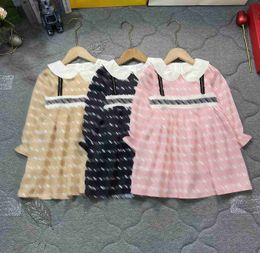 Top designer girl dress Strap decoration design Kids skirt Size 90-140 baby partydress Single breasted lapel Child frock Nov15