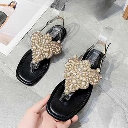 Slippers 2024 Women Ethnic Bohemia Flat Sandals Shoes Woman Crystal Flower Flip Flop Beach Sandals Casual Shoes Pearl Clip Foot Flat Drag H240521