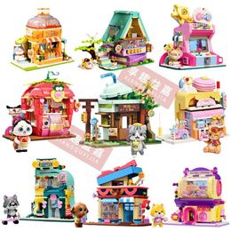 Blocks New Cute Street Girl Set Cat Strawberry House Architectural Creative Block Mike Tea Shop Building DIY Holiday Childrens Toy Gifts H240521