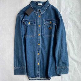 Women's denim shirt early autumn industry Brooch metal button fashion age reduction casual long sleeved cardigan