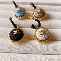 Women's earrings The latest fashion earringsFrench CELI Fashion Rope Knitted Button Set Arch Earrings Copper Plated True Gold Style Silver Needle Earrings