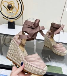 Woven hollow strap Baotou wedge high heel sandals for women 2024 summer new thick soled linen grass braid fisherman shoes fashion everything comfortable women