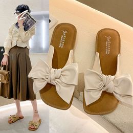 Designer Sandals Bow Shaped Slippers for Womens Outdoor Wear Beach Shoes 2024 Summer New Japanese Fashion Soft Sole One Line Sandal Trend