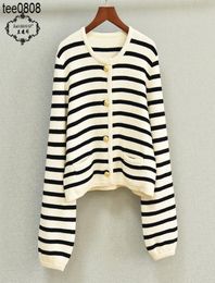 2022 Jacket autumn and winter new celinss home wool black and white stripe gold button high waist sweater women039s short knitt9877930