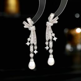 Designer Temperament earring wedding dress paired with high-end inlaid bow pearl tassel earrings Jewelry