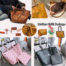 2024 Luxurys handbag Mommy clutch shop tote bag Women's mens pochette shopper bag quality designer bags MC top handle diaper Leather weekend Cross body bag