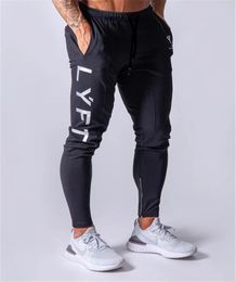 Nuovi pantaloni da jogging uomini sportivi per pantaloni da ginnastica da palestra joggers cotone trackpants slim fit bodybuilding pantalone CJ1912106694149