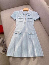 Summer Blue Solid Color Panelled Knitted Dress Short Sleeve Lapel Neck Buttons Short Casual Dresses Y4A300424