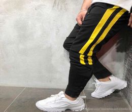 Fashionmens Designer Street Pantalones Hosen gestreiftes Knöpfe Design Bleistift Harem Hosen Casual Sports Joggers4475284