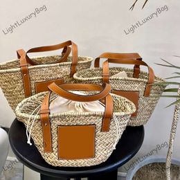 24ss Summer New Straw Bag Tote Bag Basket Woven Leather Shopping Bag Beach Bag Holiday Bag Tote Bag 240521