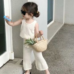 Clothing Sets Girls Clothing Sets 2024 Summer Korean Thin Knitted Girl Set Children Hollow Breathable Vest + Wide Leg Pants Two-piece Suit Y240520L64O