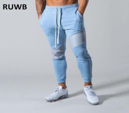 New Design Mens Pants Fitness Skinny Trousers Autumn Elastic Bodybuilding Pant Workout Track Bottom Pants Men Joggers Sweatpants1430425