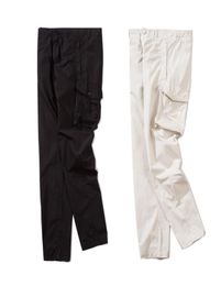 Designer pants men and women the same solid color casual laceup trousers pockets loose straightleg overalls2334397