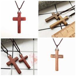 Pendant Necklaces Newly designed religious black brown colored jewelry gift wooden cross necklace ebony natural wood cross pendant sandalwood fragrance d240531